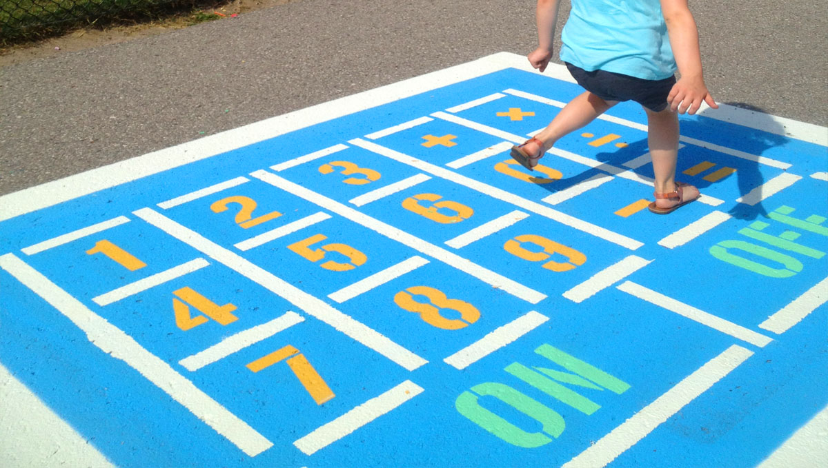 Children playing on painted playground